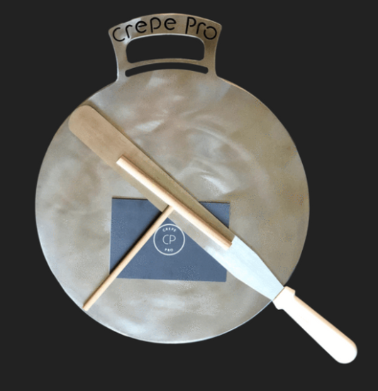 Carbon steel pan crepe pan cooking crepes on stovetop